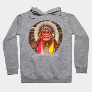 A deep looks at an Indian looking into the distance. Hoodie